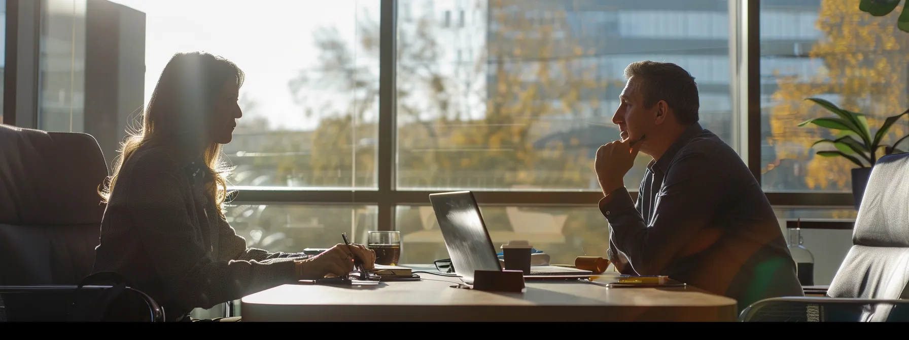 a sales representative discussing budget, authority, need, and timeframe with a potential client.